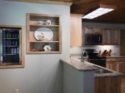 Click to enlarge image  - A custom kitchen with wood accents - New construction