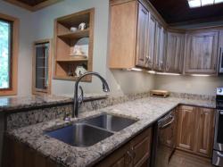 Click to enlarge image  - A custom kitchen with wood accents - New construction